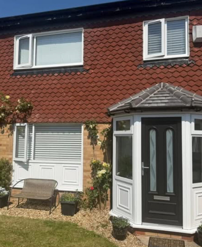 Recent Bespoke Porch Installation with Black Composite Door and Hip Roof